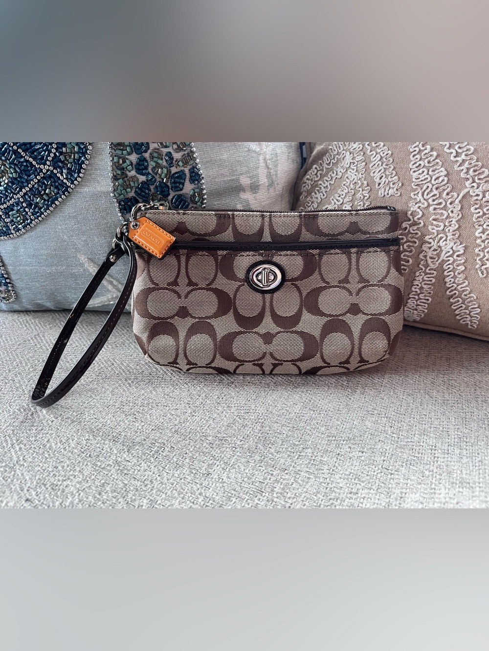 Coach Brown Signature Canvas Turnlock Wristlet with Brown Strap